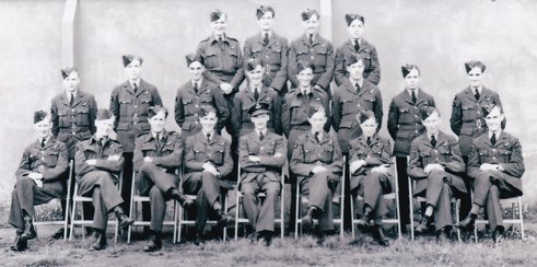 Training photo, possibly on award of their wing - Leslie is front row, 1st on the left