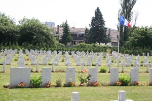 Marissel National Military Cemetary, Beauvais - the large CWGC headstone in the foreground marks the grave of the 6 men who died when ME699 was shot down
